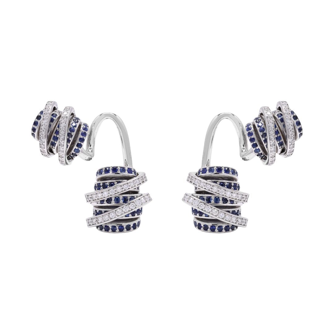 Introducing our enchanting Twisted Lock Earrings, a captivating homage to the enduring symbolism of love locks 