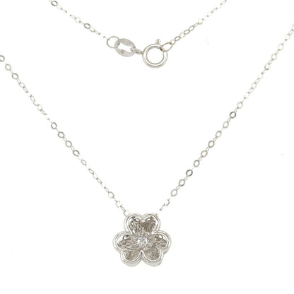 Dancing Clover Pendant - Symbol of luck and sophistication in 18k white gold with a dancing diamond.