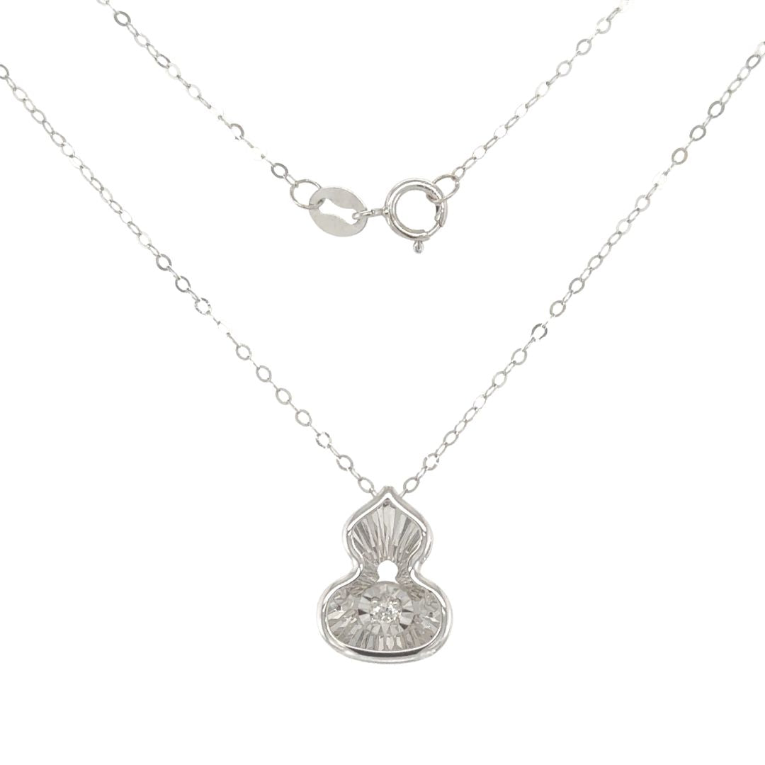 Dancing Clover Pendant - Symbol of luck and sophistication in 18k white gold with a dancing diamond.