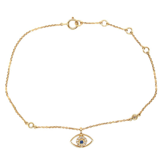 Dainty Evil Eye Bracelet in 18k Yellow Gold with 0.03ct Sapphire and 0.06ct Diamonds - A symbol of protection and style. The petite evil eye charm, featuring a captivating blue sapphire at its center, radiates calm and tranquility. Meticulously crafted with 18k yellow gold, this delicate piece weighing 1.18g offers both durability and comfort. The adjustable chain ensures a customized fit for daily wear, making it a meaningful addition to your collection as a symbol of positive energy and well-being.